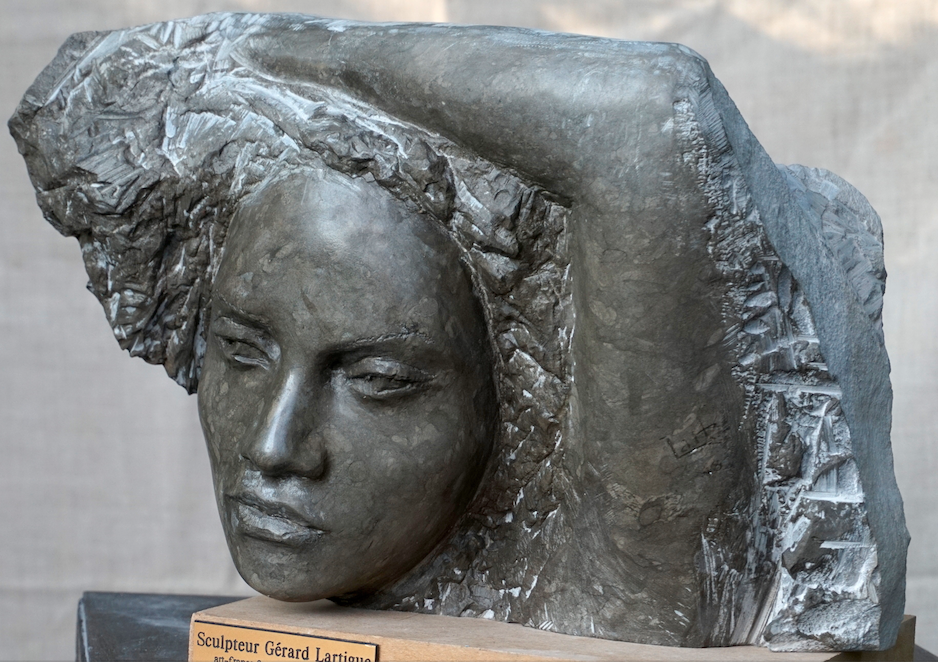 sculpture visage pierre tavel - Lartigue